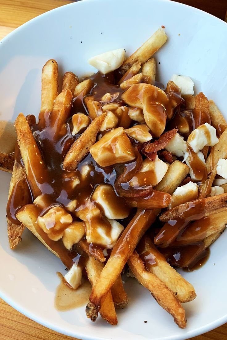 POUTINE | FOODS TO EAT IN CANADA | CANADIAN | FREE CANADA TRAVEL GUIDE TO PLAN YOUR DIY VISIT