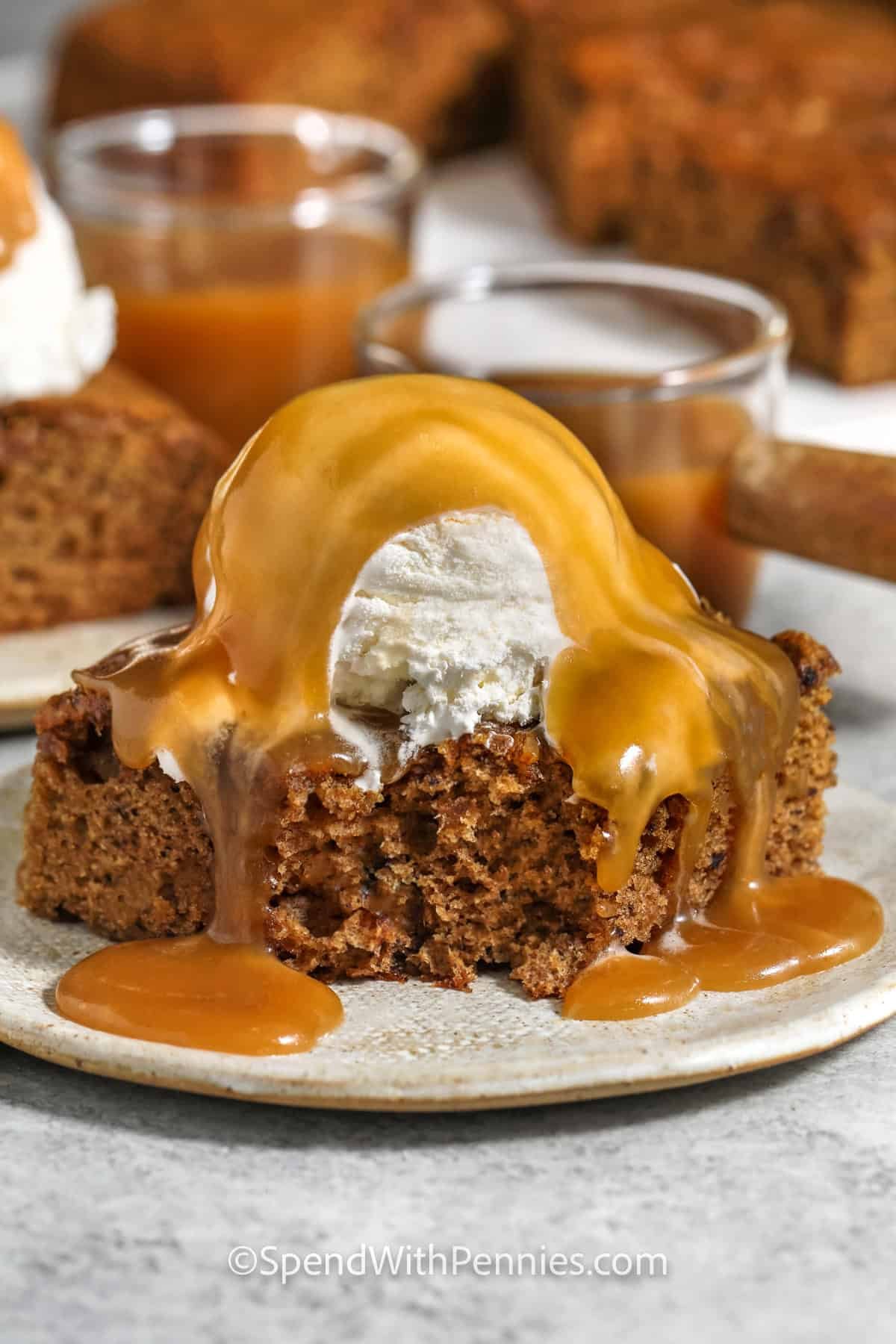 slice of Sticky Toffee Pudding with a bite taken out