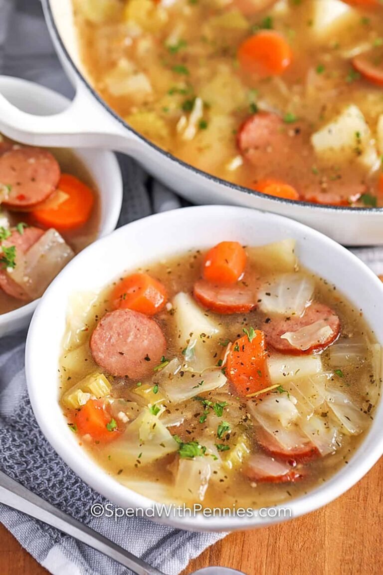 bowls of Potato and Sausage Soup with full pot.