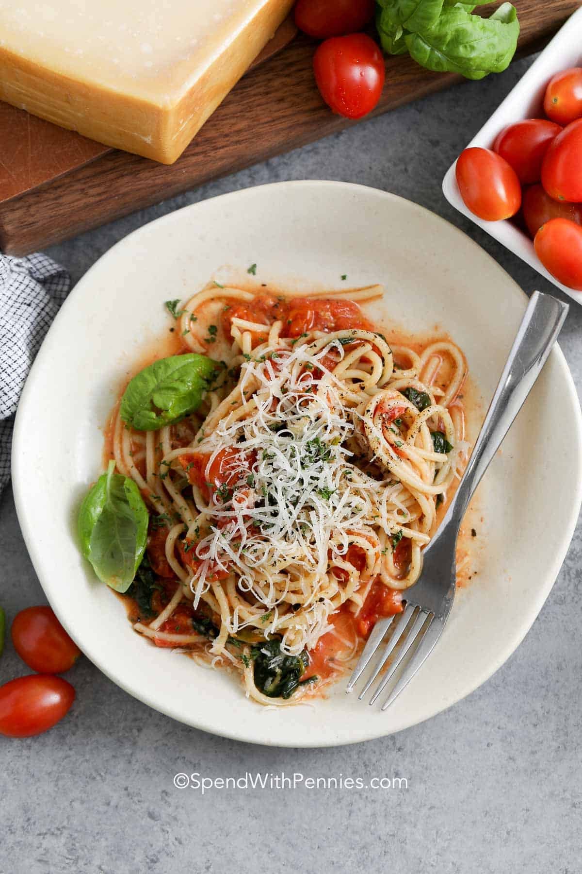 One Pot Spaghetti on a plate with parmesan cheese