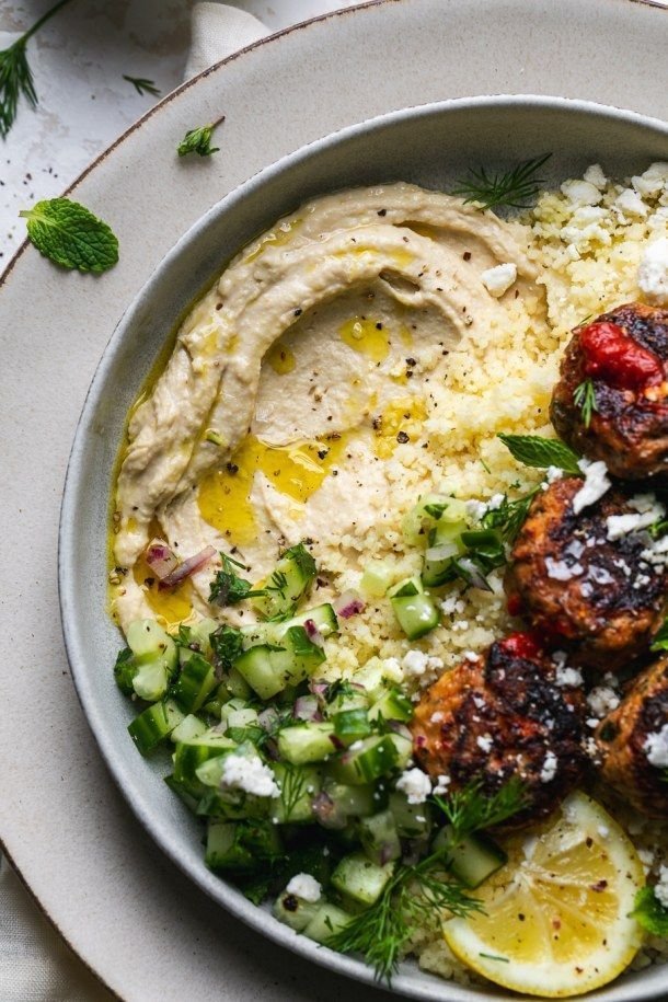 harissa chicken meatballs with couscous and cucumber herb salad